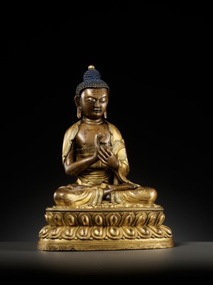Lot 55 - A PARCEL-GILT BRONZE FIGURE OF SHAKYAMUNI BUDDHA, 17TH-18TH CENTURY