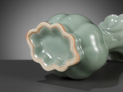 Lot 518 - A PAIR OF LOBED LONGQUAN CELADON VASES, MING DYNASTY