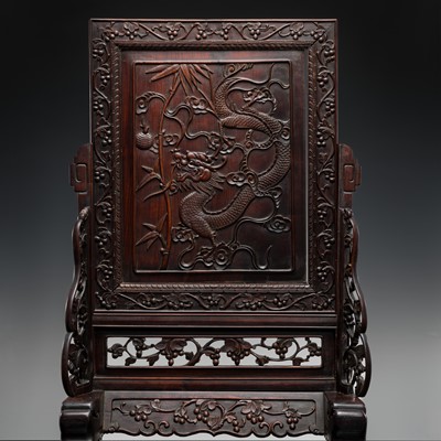 Lot 377 - A LARGE HONGMU ‘DRAGON’ TABLE SCREEN AND STAND, 19TH CENTURY