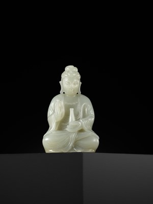 Lot 114 - A SMALL PALE CELADON JADE FIGURE OF GUANYIN, QING DYNASTY