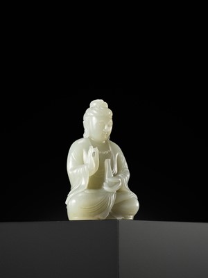 Lot 114 - A SMALL PALE CELADON JADE FIGURE OF GUANYIN, QING DYNASTY