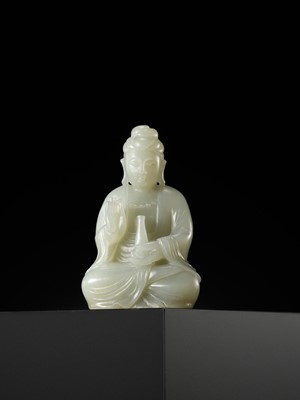 Lot 114 - A SMALL PALE CELADON JADE FIGURE OF GUANYIN, QING DYNASTY