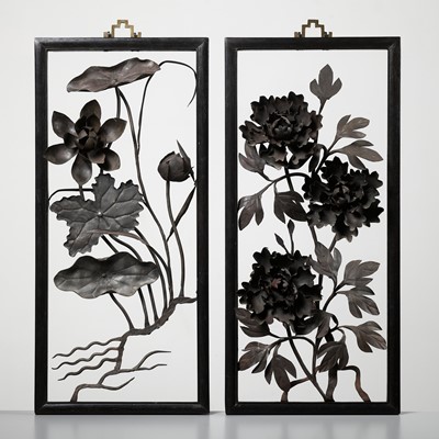 A PAIR OF IRON ‘TIEHUA’ PANELS DEPICTING PEONY AND LOTUS, IN ZITAN FRAMES, 17TH-18TH CENTURY