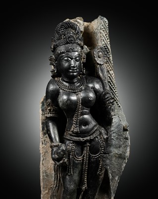 Lot 244 - A BLACK STONE FIGURE OF A FEMALE DEITY, RAJASTHAN, 10TH-11TH CENTURY