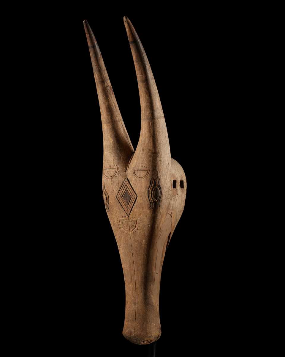 Lot 271 - A CARVED WOOD HEAD OF A BULL, KERALA, 18TH-19TH CENTURY
