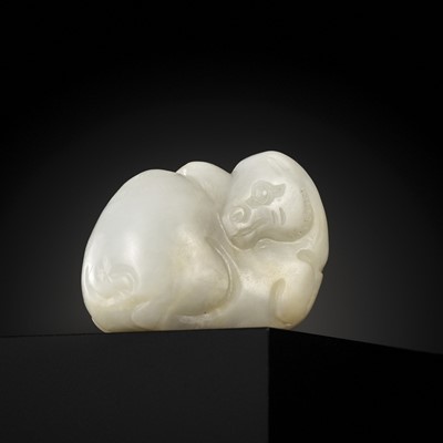 Lot 437 - A WHITE AND RUSSET JADE ‘CAMEL’ PENDANT, TANG-SONG DYNASTY