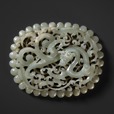 Lot 159 - A PALE CELADON JADE ‘CHILONG’ RETICULATED PLAQUE, MING DYNASTY