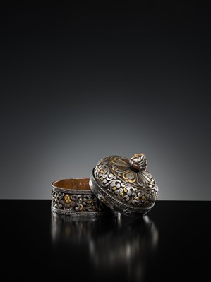 Lot 282 - A GOLD, SILVER AND COPPER DAMASCENED IRON BOX AND COVER, TIBET, 16TH - 17TH CENTURY