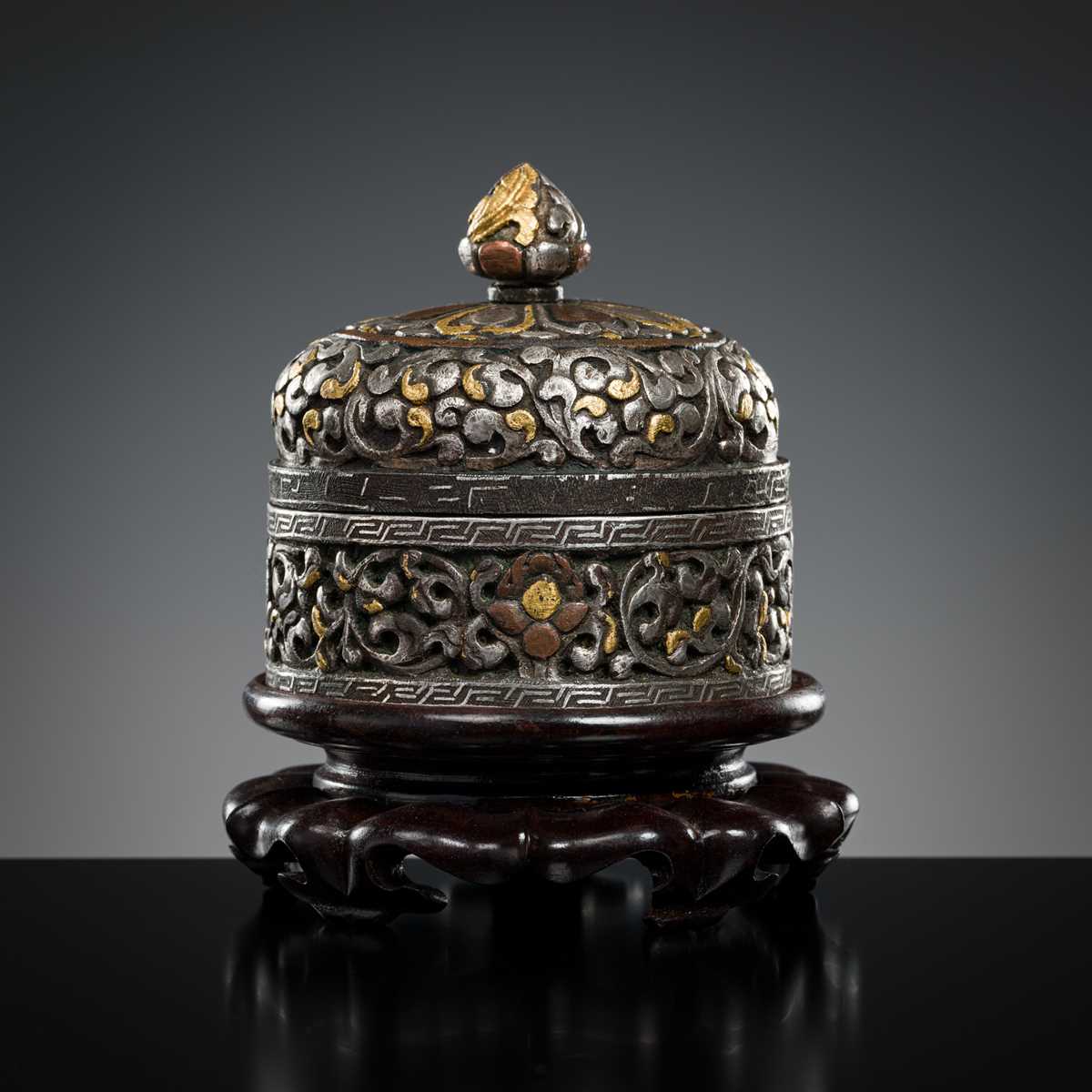 Lot 282 - A GOLD, SILVER AND COPPER DAMASCENED IRON BOX AND COVER, TIBET, 16TH - 17TH CENTURY