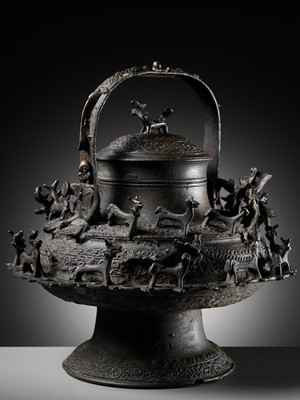 Lot 211 - A MASSIVE BRONZE ‘DRAGON’ KETTLE, CEREK, BORNEO, 19TH CENTURY