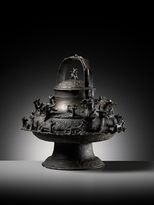 Lot 211 - A MASSIVE BRONZE ‘DRAGON’ KETTLE, CEREK, BORNEO, 19TH CENTURY