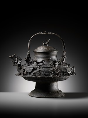 Lot 211 - A MASSIVE BRONZE ‘DRAGON’ KETTLE, CEREK, BORNEO, 19TH CENTURY