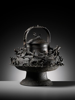 Lot 211 - A MASSIVE BRONZE ‘DRAGON’ KETTLE, CEREK, BORNEO, 19TH CENTURY