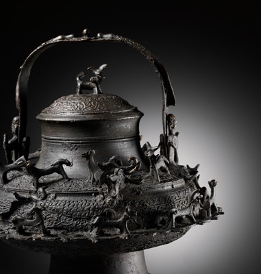 Lot 211 - A MASSIVE BRONZE ‘DRAGON’ KETTLE, CEREK, BORNEO, 19TH CENTURY
