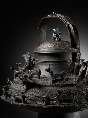 Lot 211 - A MASSIVE BRONZE ‘DRAGON’ KETTLE, CEREK, BORNEO, 19TH CENTURY