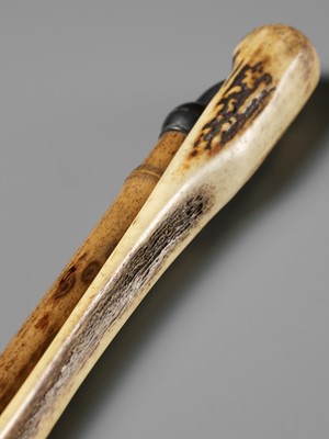 A FINE ANTLER AND WOOD TONKOTSU DEPICTING BATS, WITH AN ANTLER PIPE CASE AND A BAMBOO AND SILVER PIPE