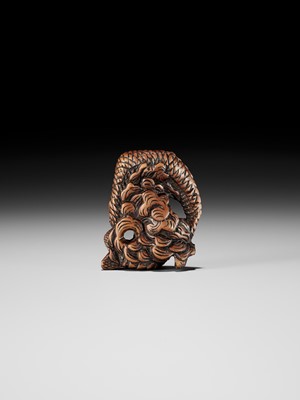 Lot 13 - A POWERFUL WOOD NETSUKE OF A COILED DRAGON