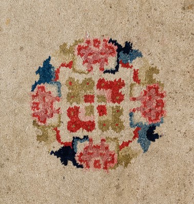 A FLORAL WOOL CARPET, QING DYNASTY