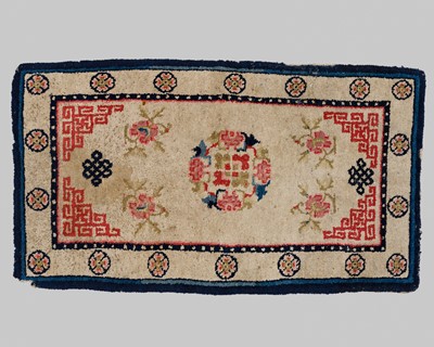 A FLORAL WOOL CARPET, QING DYNASTY