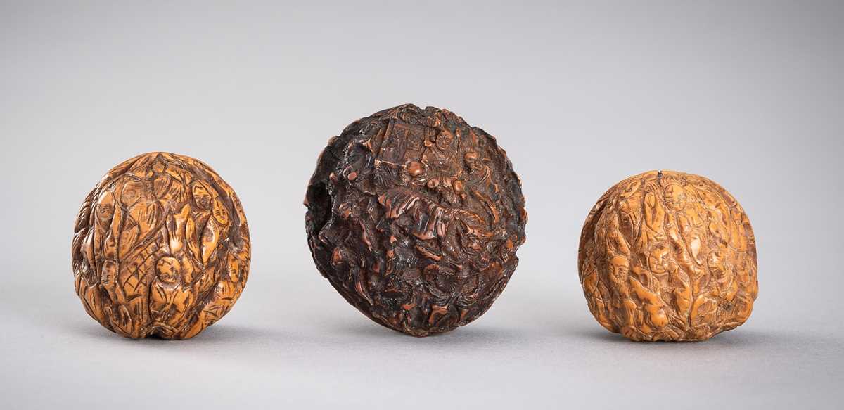 Lot 713 - A GROUP OF THREE WALNUT CARVINGS, c. 19020s