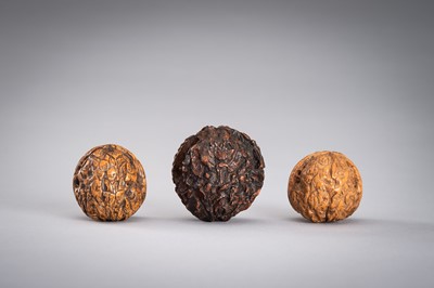 Lot 713 - A GROUP OF THREE WALNUT CARVINGS, c. 19020s