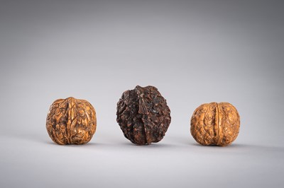 Lot 713 - A GROUP OF THREE WALNUT CARVINGS, c. 19020s