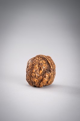 Lot 713 - A GROUP OF THREE WALNUT CARVINGS, c. 19020s