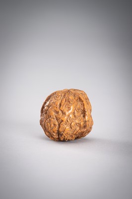 Lot 713 - A GROUP OF THREE WALNUT CARVINGS, c. 19020s