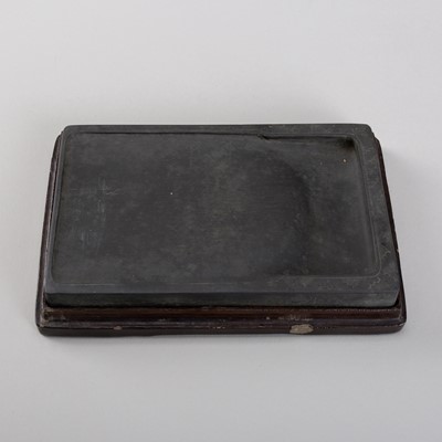 Lot 1805 - AN INKSTONE AND FITTED WOOD BOX, LATE QING DYNASTY