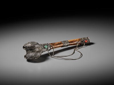 Lot 289 - A CORAL AND TURQUOISE-INLAID SILVER-MOUNTED BONE FLUTE, KANGLING, TIBET, 19TH CENTURY