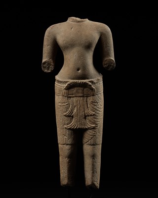 Lot 187 - A KHMER GRAY SANDSTONE TORSO OF A MALE DEITY, BAKHENG STYLE, ANGKOR PERIOD