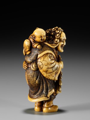 Lot 27 - OKAKOTO: A FINE IVORY NETSUKE OF A DUTCHMAN WITH CHILD