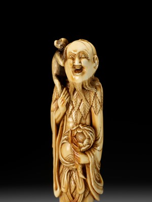 Lot 5 - A SUPERB AND LARGE IVORY NETSUKE OF A SENNIN WITH A MONKEY