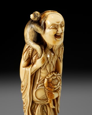 Lot 5 - A SUPERB AND LARGE IVORY NETSUKE OF A SENNIN WITH A MONKEY