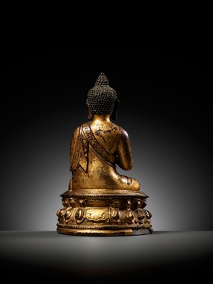 Lot 51 - A RARE GILT LACQUERED BRONZE FIGURE OF BUDDHA, INSCRIBED JINGANG BUHUAI FO (BUDDHA OF ADAMANTINE INDESCTRUCTIBILITY), MING DYNASTY, 14TH-15TH CENTURY