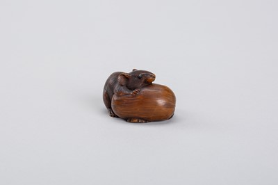 Lot 340 - A RARE COROZO NUT NETSUKE OF A RAT ON A GOURD