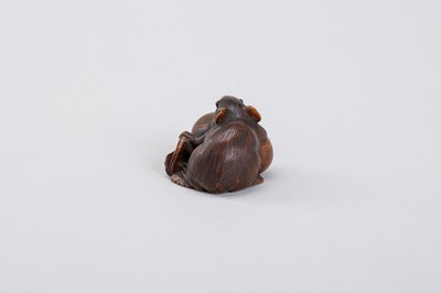Lot 340 - A RARE COROZO NUT NETSUKE OF A RAT ON A GOURD