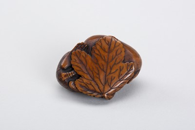 Lot 340 - A RARE COROZO NUT NETSUKE OF A RAT ON A GOURD
