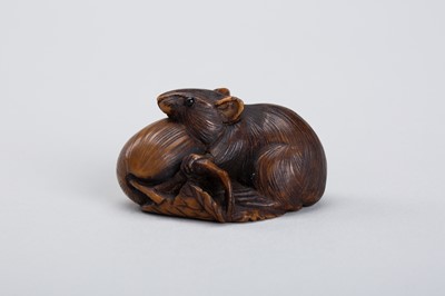 Lot 340 - A RARE COROZO NUT NETSUKE OF A RAT ON A GOURD