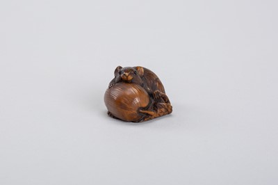 Lot 340 - A RARE COROZO NUT NETSUKE OF A RAT ON A GOURD