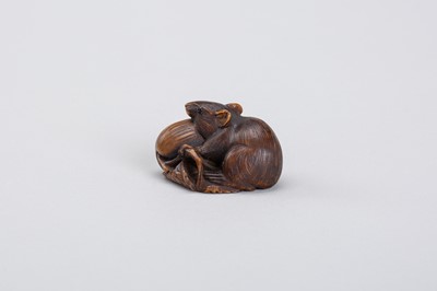 Lot 340 - A RARE COROZO NUT NETSUKE OF A RAT ON A GOURD