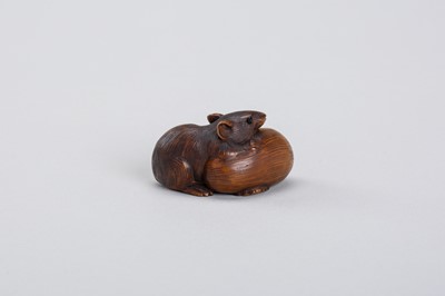 Lot 340 - A RARE COROZO NUT NETSUKE OF A RAT ON A GOURD