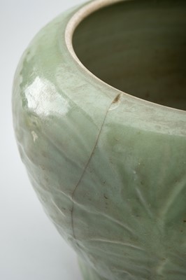 Lot 1856 - A CARVED AND MOLDED LONGQUAN CELADON ‘LOTUS’ PORCELAIN JAR, YUAN TO MING DYNASTY