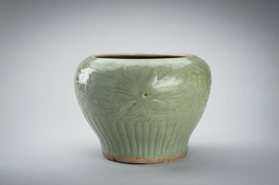 Lot 1856 - A CARVED AND MOLDED LONGQUAN CELADON ‘LOTUS’ PORCELAIN JAR, YUAN TO MING DYNASTY