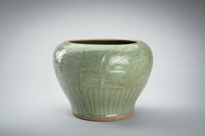 Lot 1856 - A CARVED AND MOLDED LONGQUAN CELADON ‘LOTUS’ PORCELAIN JAR, YUAN TO MING DYNASTY
