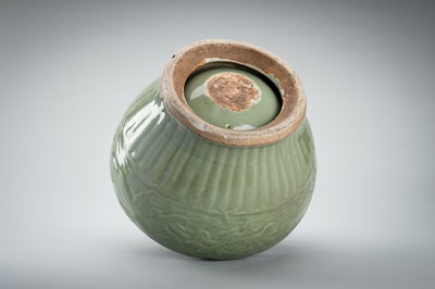 Lot 1856 - A CARVED AND MOLDED LONGQUAN CELADON ‘LOTUS’ PORCELAIN JAR, YUAN TO MING DYNASTY