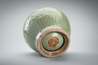 Lot 1856 - A CARVED AND MOLDED LONGQUAN CELADON ‘LOTUS’ PORCELAIN JAR, YUAN TO MING DYNASTY