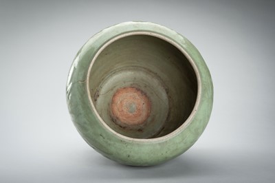 Lot 1856 - A CARVED AND MOLDED LONGQUAN CELADON ‘LOTUS’ PORCELAIN JAR, YUAN TO MING DYNASTY