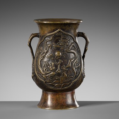 Lot 342 - A BRONZE ‘DRAGONS AND PHOENIXES’ VASE, HU, QING DYNASTY