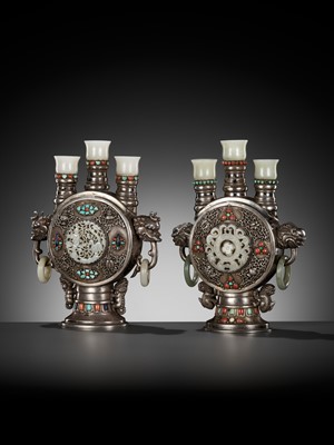 Lot 291 - A PAIR OF MONGOLIAN GEMSTONE-INLAID AND JADE-MOUNTED SILVER CANDLE HOLDERS